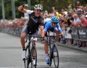 Hayden Roulston celebrates victory over Jack Bauer in the Calder Stewart Elite National Road Cycling Championships in Christchurch today.